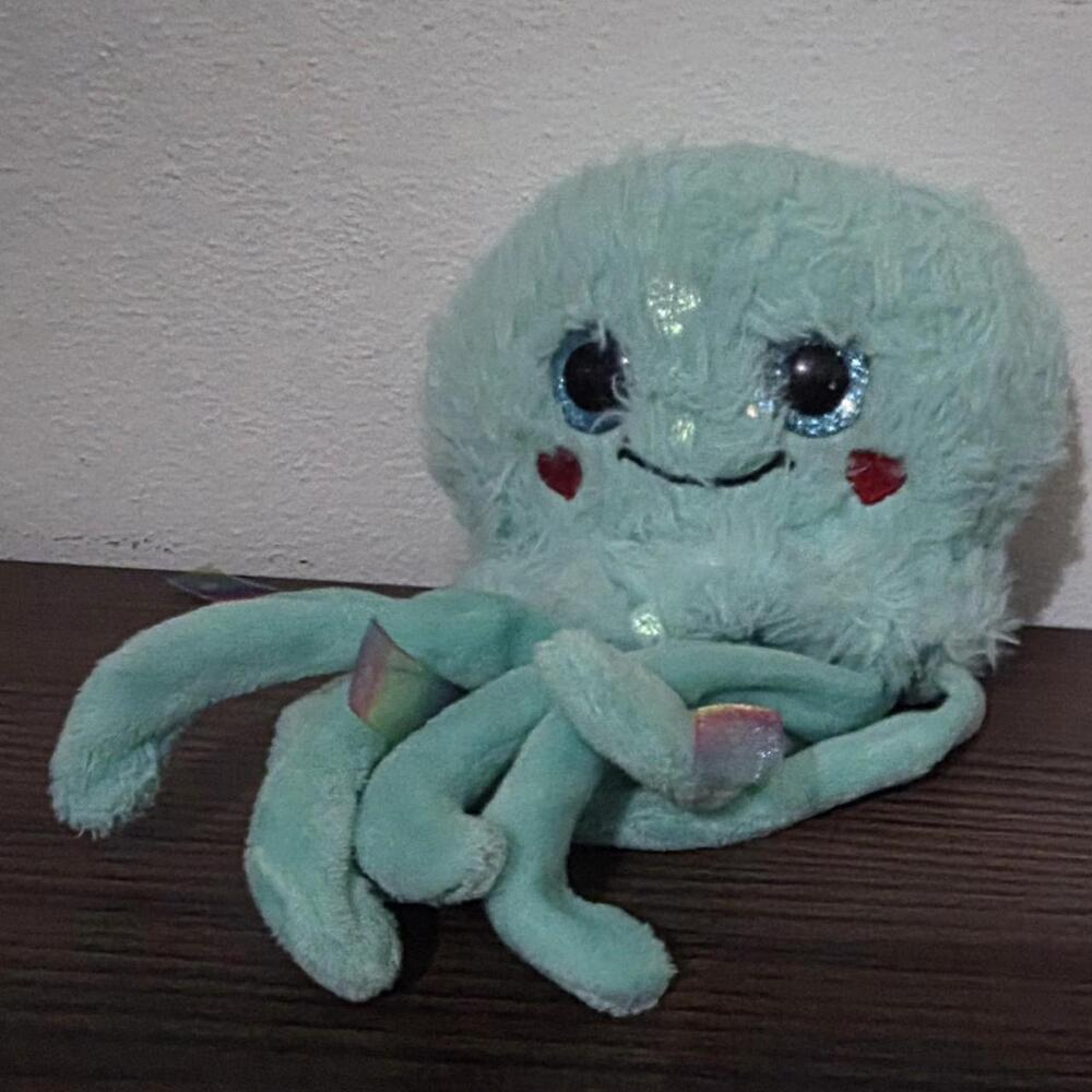 Blue octopus plushie with glittery eyes and red heart cheeks #kawaii #cute